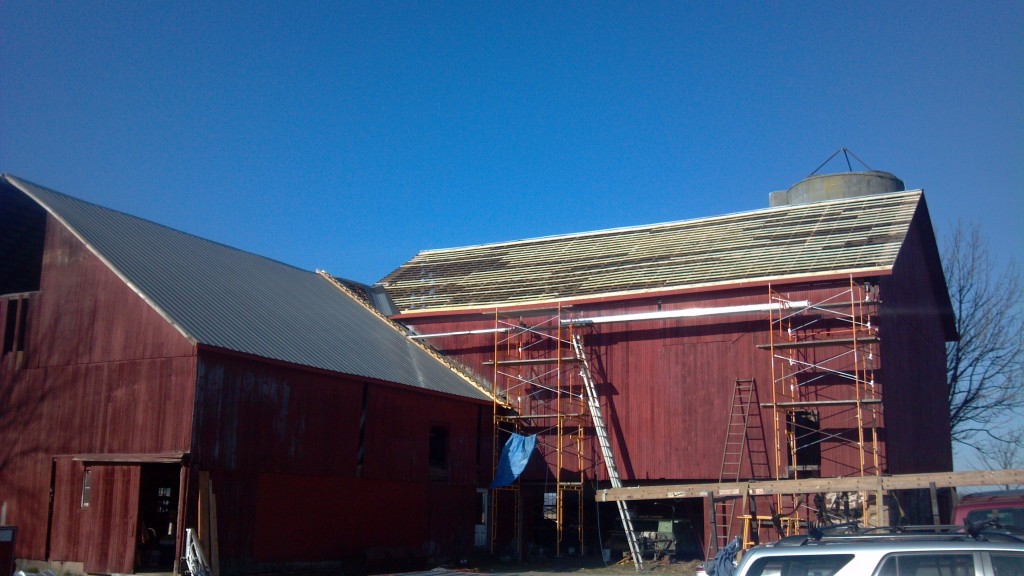 Half way through repairing the barn roof.  